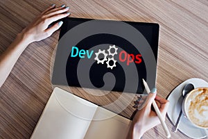 DevOps - development cycles of Automation and monitoring at all steps of software construction. photo