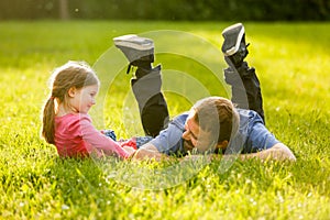 Devoted father and daughter talking, having fun