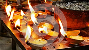 Devotee lighting up candles