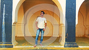 Devotee standing in temple of Khandoba