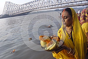 Devotees at Chat pujo.