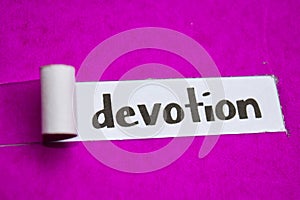 Devotion text, Inspiration, Motivation and business concept on purple torn paper