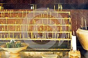 Devotional candles at Wat Phra Kaew, Chiang Rai, Thailand