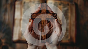 Devout Christian woman holding a wooden cross in prayer with a vintage bible in the background.