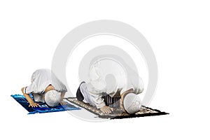 Devout family is prostration on studio photo