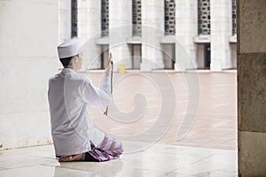 Devout Muslim man prays to the Allah