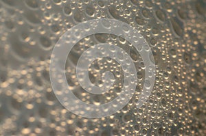 Dew of boiling water on plastic cap in the kitchen