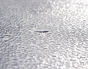 Dew drops on metal surface