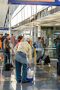 DFW airport - passengers in the Skylink station