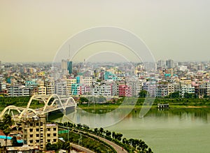 Dhaka city, Bangladesh - view of the buildings and a lake from the capital of Bangladesh photo