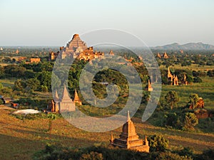 Dhammayan Gyi Temple on the sunset in Bagan photo