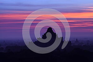 Dhammayangyi Pahto pagoda at sunset in Bagan Archaeological zone
