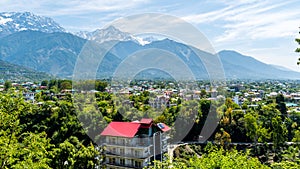 Dharamshala of Himachal Pradesh surrounded by cedar forests and Dhauladhar mountain range