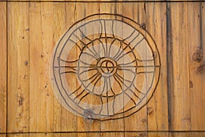 Dharma Wheel Buddhist symbol in door