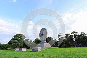 Dharmacakra or the wheel of doctrine at Phutthamonthon,Buddhist park in Nakhon Pathom Province,Thailand.It is the symbolic stone