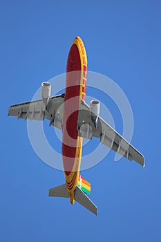 DHL Airbus A300 in rainbow colors on tail departing from Amsterdam Schiphol Airport at Aalsmeerbaan