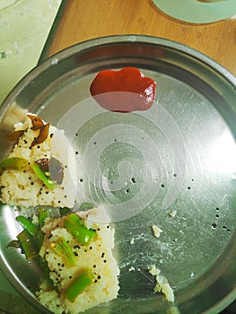 Dhokla is an Indian savoury snack made of rice flour, Originated in Gujarat.