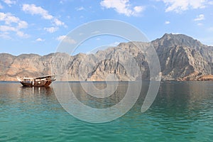 Dhow in Khasab Bay, Oman photo