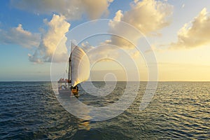 Dhow at sunset and background clouds
