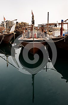 Dhows, the traditional Fishing boats in the fishing harbor of Manama, Bahrain