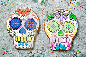 Dia de los muertos concept - skull shaped cookies with colorful decorations photo