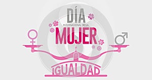 DIA INTERNATIONAL DE LA MUJER - INTERNATIONAL WOMEN S DAY in Spanish language. Text in pink color on scale with EQUALITY word and photo