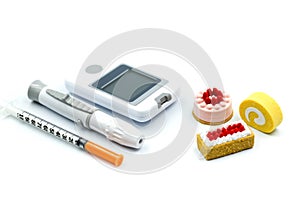 Diabetes blood glucose test with sweet desserts,Healthcare concept.