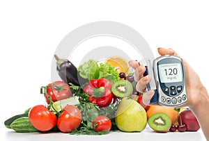 Diabetes concept glucose meter fruits and vegetables