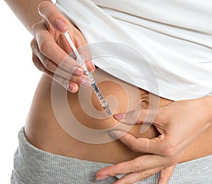 Diabetes patient insulin shot by syringe with dose of lantus photo