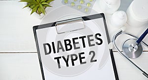 DIABETES TYPE 2 written on a clipboard