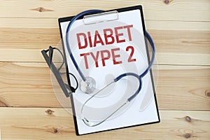 DIABETES TYPE 2 written on a clipboard, Medical