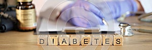 Diabetes word collected with wooden blocks in row