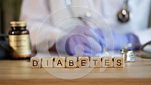 Diabetes word collected with wooden cubes in row