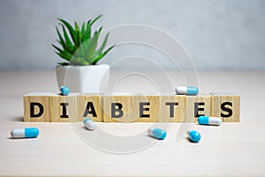 Diabetes word in crossword style block letters background in health care and healthy nutrition concept