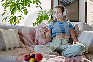 Diabetic woman watching social media content on smart phone.