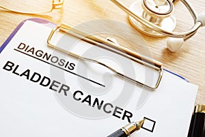 Diagnosis bladder cancer on a desk. photo