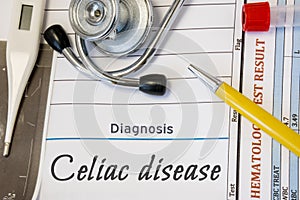 Diagnosis of Celiac disease. Health history document with diagnosis celiac disease is on doctors table, surrounded by stethoscope,