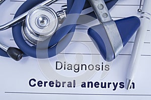 The diagnosis of Cerebral aneurysm. Paper medical history with diagnosis of Cerebral aneurysm, on which lie stethoscope, neurologi