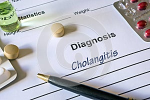 Diagnosis cholangitis written in the diagnostic form photo