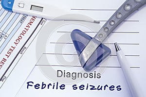 Diagnosis Febrile Seizures. Paper medical report written with neurological diagnosis of Febrile Seizures is surrounded by a neurol