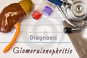 Diagnosis Glomerulonephritis photo. Figure of kidney lies next to incription of diagnosis of glomerulonephritis, result of ultras photo
