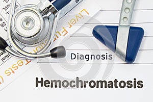 Diagnosis Hemochromatosis. Neurological hammer, stethoscope and liver laboratory test lie on note with title of hereditary disease