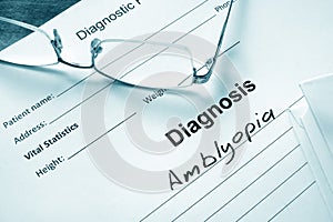 Diagnosis list with Amblyopia and glasses.