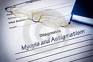Diagnosis list with Astigmatism and myopia photo