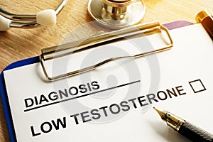 Diagnosis Low testosterone on a desk.