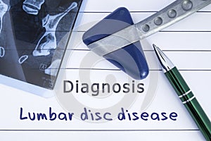 Diagnosis of Lumbar disc disease. Medical health history written with diagnosis of Lumbar disc disease, MRI image sacral spine and