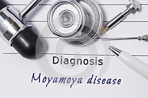 Diagnosis of Moyamoya Disease. Medical doctor`s statement with diagnosis Moyamoya Disease is on neurologist workplace, which are s photo