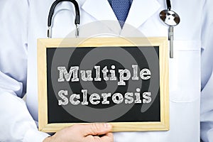 Diagnosis multiple sclerosis doctor holding chalkboard photo