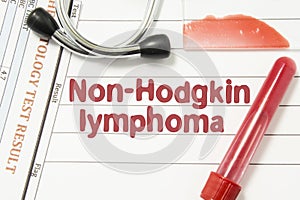 Diagnosis of Non-Hodgkin lymphoma. Laboratory blood bottle, glass slide with blood smear, hematology test, stethoscope lying on no