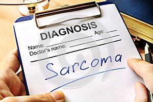Diagnosis sarcoma in medical form. photo